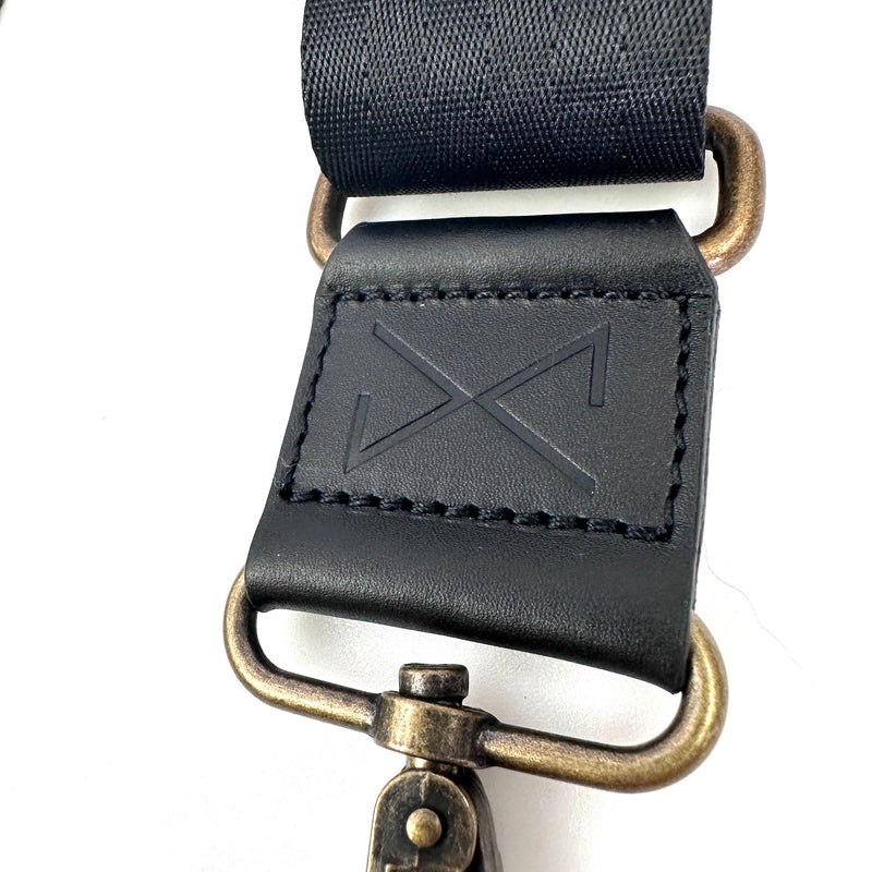 Black adjustable shoulder strap