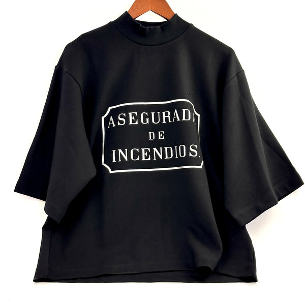 SS TURTLE NECK NEGRA "asegurada de incendios"